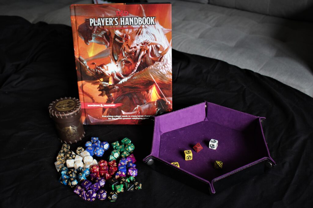 Dungeons and Dragons Player Book and Dice